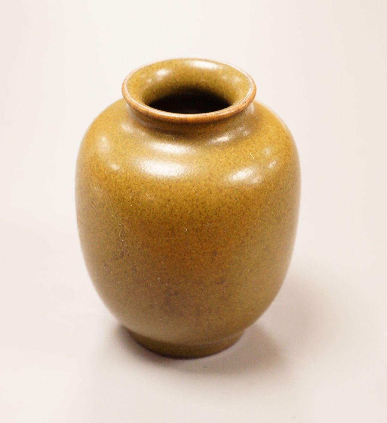 A Chinese miniature tea dust glazed jar, height 5.5cm